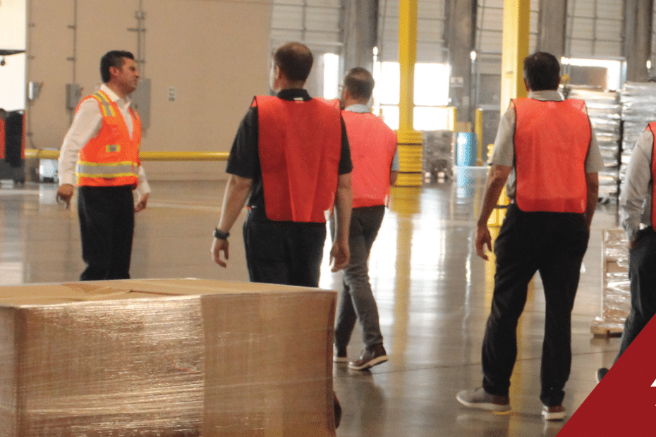 picture of employees walking through a facility