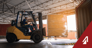 dock worker loading freight into a trailer